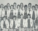 A group of teenage girls wearing basketball uniforms