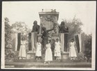 women stand in front of a statue at Lafayette Park. Library of Congress