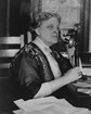 black and white portrait of catt speaking into an old fashioned candlestick phone. LOC