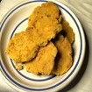 Round, stiff, pancake-looking patties with irregular edges. 
