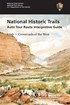 The cover of a travel guide that has an illustration of a large, wide canyon with a wagon train