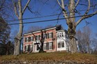 Two-story brick building. 