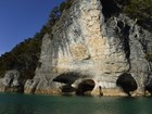 A limestone bluff protrudes into the Buffalo River.
