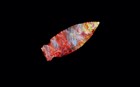 colorful arrowhead on black background