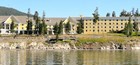 large yellow building along shoreline