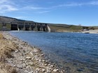 A blue river and an afterbay dam.