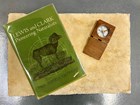 Photo of small green booklet.  Lewis and Clark Pioneering Naturalists. Drawing of Bighorn Sheep.