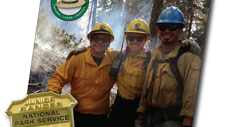 Cover of the wildland firefighter junior ranger booklet with badge.