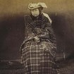 An old photo of Christina McDonald McKenzie Williams sitting in a chair, 1861.