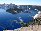 photo of a snow covered volcanic summit caldera