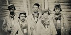 Four uniformed Confederate soldiers stare directly at the camera in this sepia photo.
