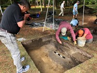Archaeologists carefully excavate a feature during a September 2021 dig at Fort Raleigh.