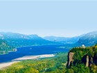 Vista house perches on a cliff in an iconic view of the Columbia River Valley in OR and WA