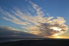 A beautiful sunset with swirly clouds over Ikpek Lagoon. 