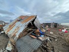 A dilapidated fish camp near Nome, AK after Typhoon Merbok. 
