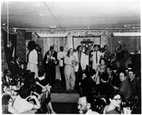 Acto a Marti gathering at Club Cubano Inter-Americano with Machito playing the maracas