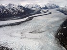 Two glaciers flow together in the mountains.