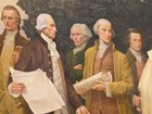 Elbridge Gerry in background of a mural of the framers of the Constitution with arms crossed.