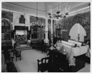 Interior of synagogue with Ark, holding six Torahs, and Bimah (or pulpit) facing it