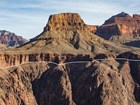 Photo of cliffs and a flat topped butte.