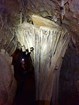 A 10 foot cave shield being lit up from the side by a cave researcher