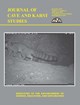 Cover of the journal of cave and karst studies cover with a ringtail on it.