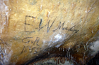 A signature in Lehman Cave dating from 1885. This signature is by E. W. Meecham.
