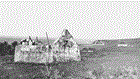 Black and white photo of deteriorating hut transitions to grass hut with palm roof