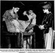 two youths wearing welding masks receive instruction on metal work from an adult male