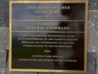 Photo of a brass commemorative plaque.