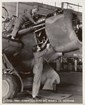 black and white photo of two women engaged in industrial defense work