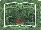 Merrimack Manufacturing Company Label and an outline of an open book