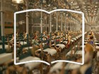 Photograph of a model of a weaving room with an open book outline