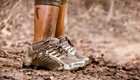 a close up of muddy shoes