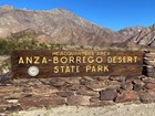 Photo of rocky desert, wooden sign, sign says Headquarters Area Anza-Borrego Desert State Park
