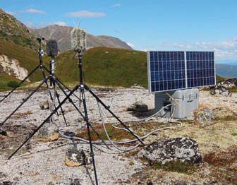 Equipment sits on a hillside