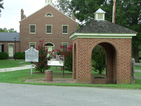 historic red brick buildings with historic marker