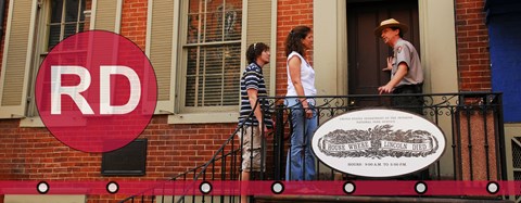 A ranger leads a tour of the Peterson House.
