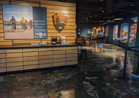 Lobby area with maps and desk.
