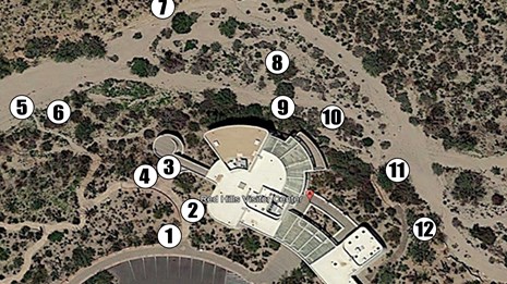 Aerial image shows numbers 1 - 12 in clockwise order around the Redhills VC, starting in lower left.