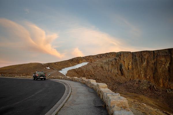 view of rocky cliff face from the road
