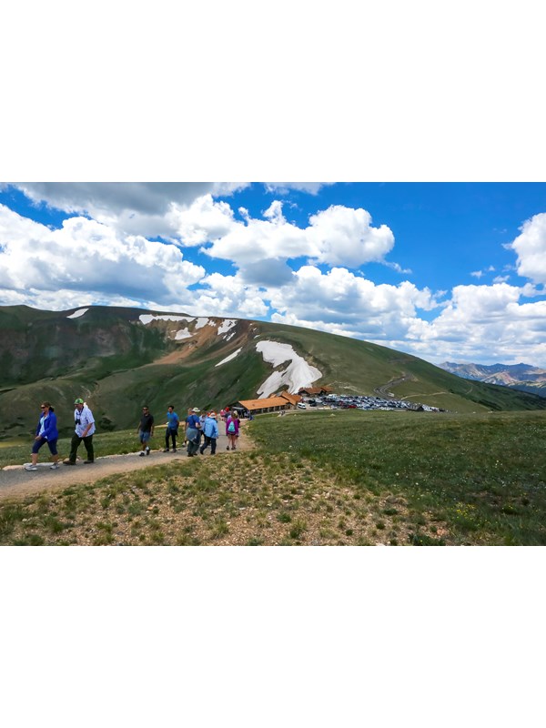 View of the Alpine Ridge Trail looking down at the Alpine Visitor Center and Parking Area