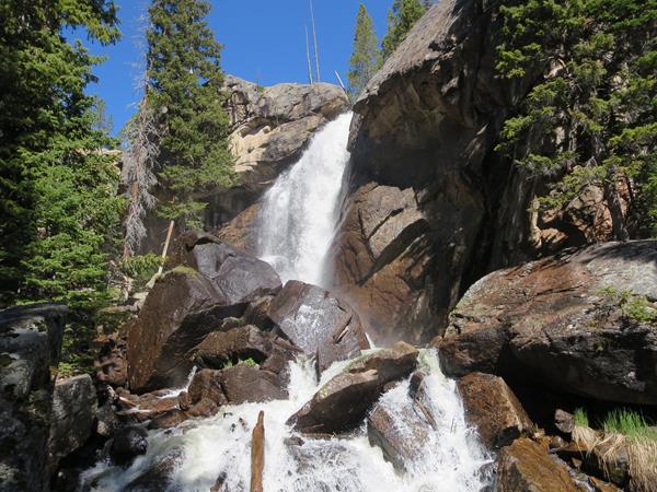 water cascading over a rocky cliff