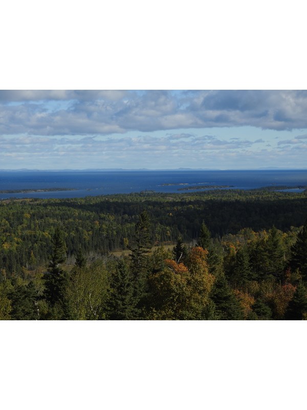 View from a ridge top. Lake Superior and the Canadian Shoreline can be seen in the distance.