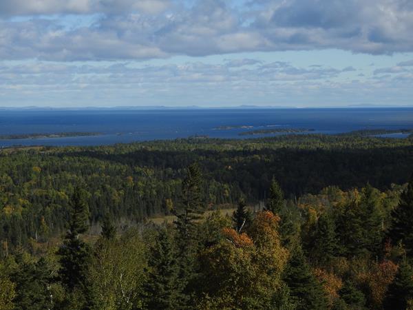 View from a ridge top. Lake Superior and the Canadian Shoreline can be seen in the distance.