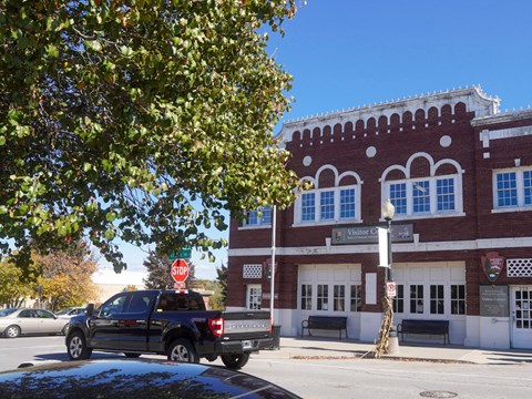Red brick building, street in front
