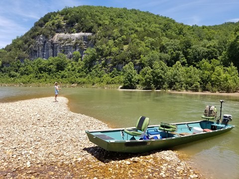 A jon boat on a gravel bar between Maumee and Spring Creek