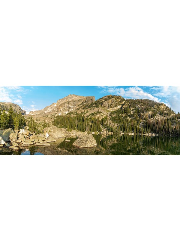 rocky mountains jutting over a lake
