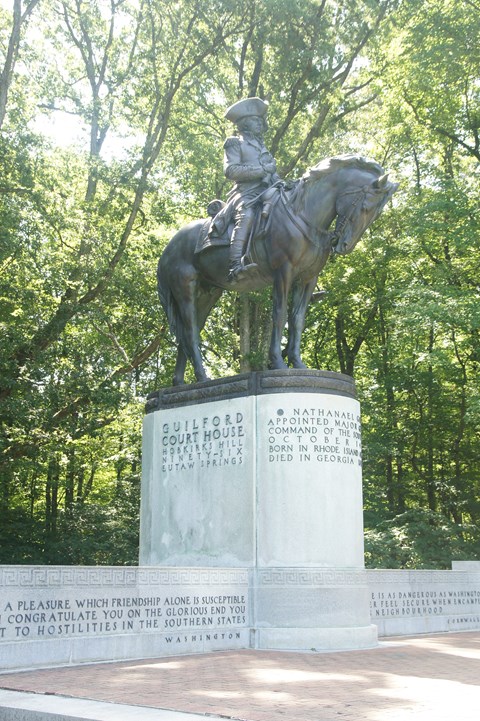 Equestrian monument of Major General Nathanael Greene, on a tall granite base.