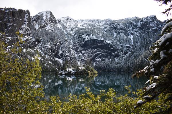 A mountain like with snow all around